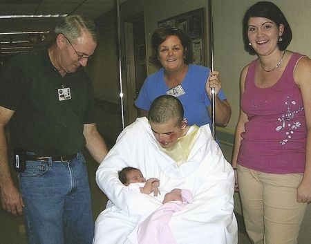 Jae Barclay with his new daughter