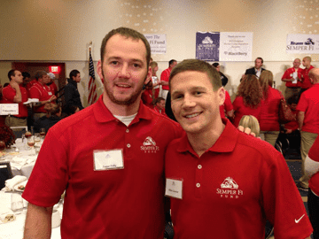 asper H. with Medal of Honor recipient Kyle C., volunteering at a Semper Fi Fund event.